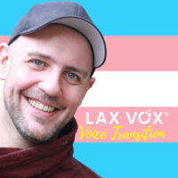Thomas Lascheit in front of transgender flag
